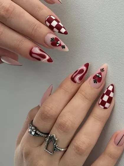 For a more edgy vibe, this set combines a red and white checkerboard pattern with abstract swirls and a cute but moody heart character.