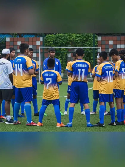 The U15 team huddles up for a tactical discussion during a break in their Thane Youth League match.