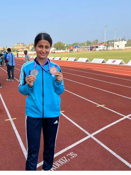 A proud moment for one of my para-athletes, showcasing her two medals from the 22nd National Para Athletics Championships. Her dedication is an inspiration to us all.