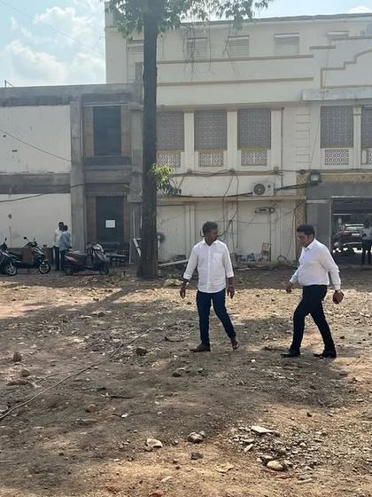 A site visit to the 'Dream City Chambers' project in Amravati. Here we are assessing the initial ground conditions in a tight urban plot, a crucial first step in planning for excavation and foundation work.