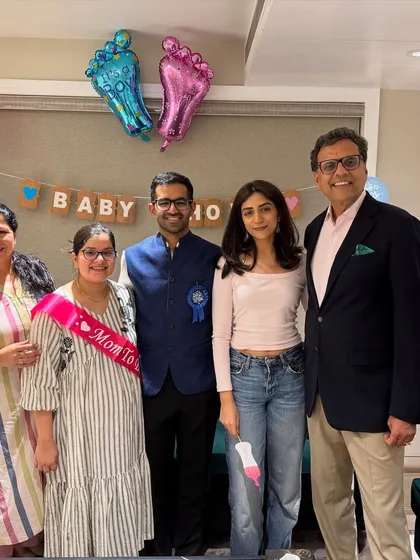 Another happy moment from the baby shower held in our chambers. Our team is a family, and we celebrate each other's life milestones.
