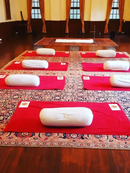 This is a simple setup for a restorative yoga session, with mats and bolsters ready. You don't need a fancy studio to practice. The most important thing is creating a space where you can feel calm, supported, and ready to connect with your mind and body.