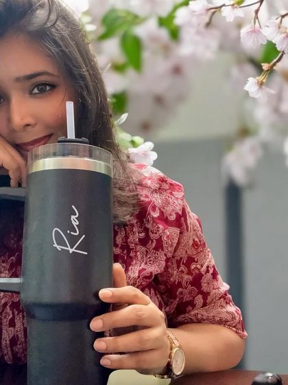 Here I am, staying hydrated with one of my most popular items. This personalized black tumbler, inspired by the viral Stanley cup, can be engraved with any name in a beautiful script font.