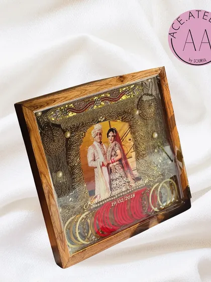 Your bridal story doesn't end with the wedding. I preserved this bride's precious kaleeras, chuda, and wedding photo in a deep teakwood frame, creating a stunning piece of wall art filled with memories.