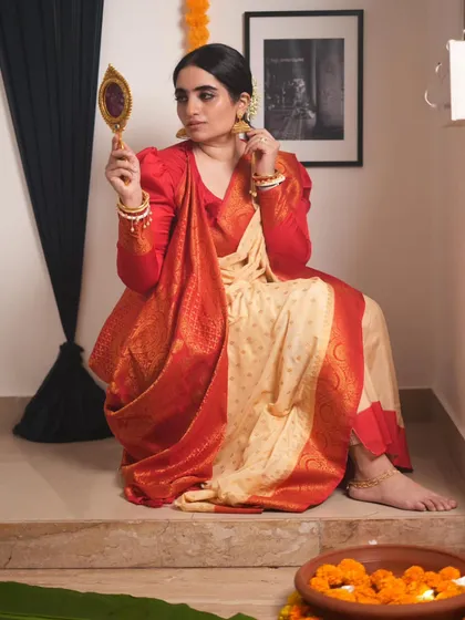 There is a unique poetry to the classic Bengali drape, with its distinctive box pleats and pallu thrown over the shoulder. This style is perfect for festive occasions like Durga Puja, and I teach the authentic technique to capture its timeless charm.