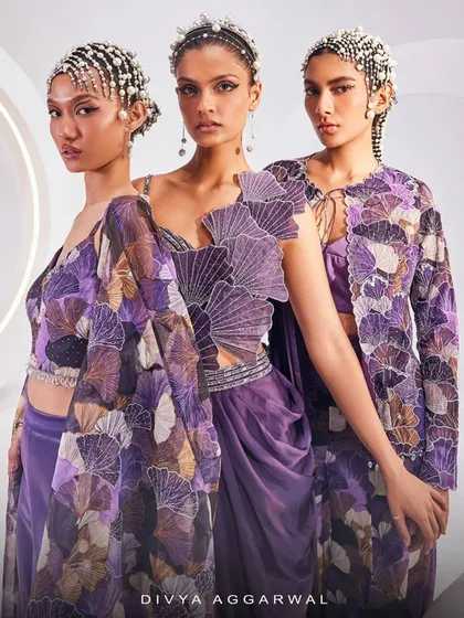 A showcase of my purple collection, featuring the Zoey Cape Set, Ariel Saree Set, and Muriel Jacket Set. Each piece is designed for effortless glamour with a bold edge.