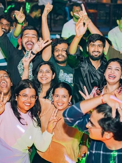 A big group of happy guests posing for the camera. The sense of community is strong.
