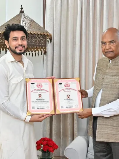 It was a moment of immense grace to be honored by the former President of India, Shri Ram Nath Kovind ji. Presenting him with a portrait I painted was a humbling experience. This recognition is not just for me, but for the tradition of sacred art that I serve.