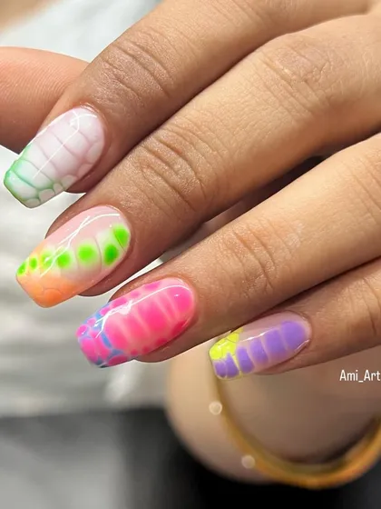 Another look at these vibrant, multi-colored Holi special nails.