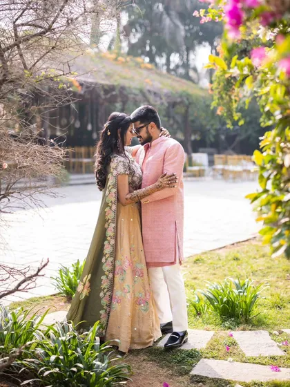 A beautiful collection of photos from Disha and Sumanth's pre-wedding shoot. Her makeup is soft and romantic, perfect for these candid and posed shots in a lovely garden setting.