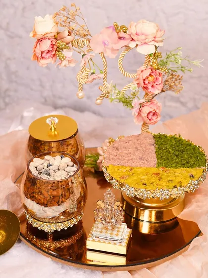 For Ganesh Chaturthi, I honor tradition with timeless elegance. This hamper features artisanal modaks and other sweets, thoughtfully curated to embody devotion and craftsmanship.