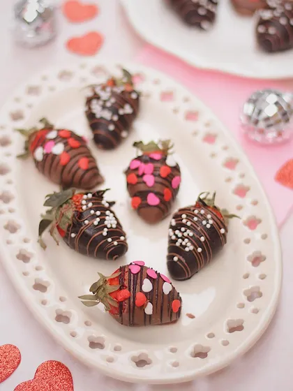 A plate of our Valentine's special chocolate-covered strawberries. The combination of fresh, juicy strawberries and rich chocolate is a classic for a reason.