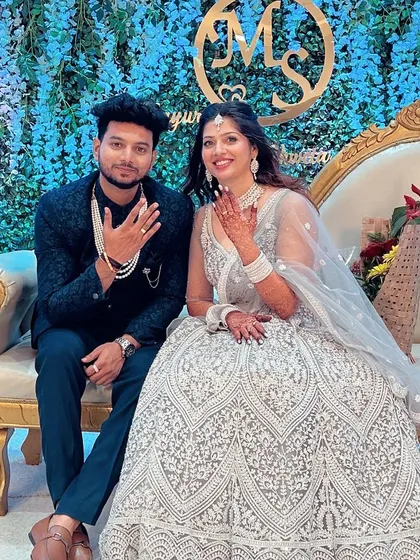 The perfect engagement look for a modern couple. I gave the bride a glamorous makeup look with soft curls and provided subtle grooming for the groom so they shine together.
