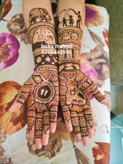 Baby shower mehndi is very special. This design tells the story of a growing family, with motifs like baby footprints, a cradle, and family figures, all woven into a beautiful full-hand design.