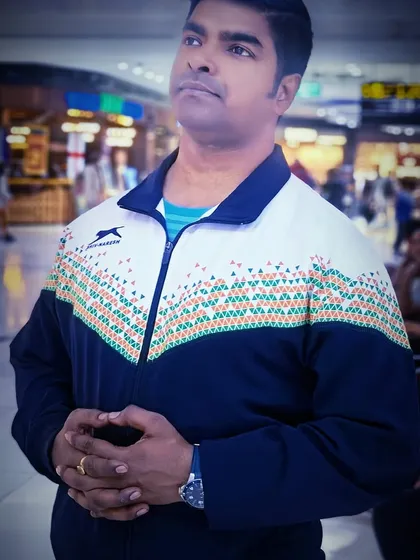At the airport, ready for an international karate championship. I carry the pride of my academy and my country with me.