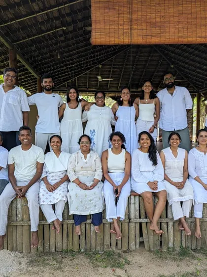 Dressed in white to honor the peace and connection we cultivated during our time together. A beautiful group portrait from our rejuvenating yoga and wellness retreat in Sri Lanka.