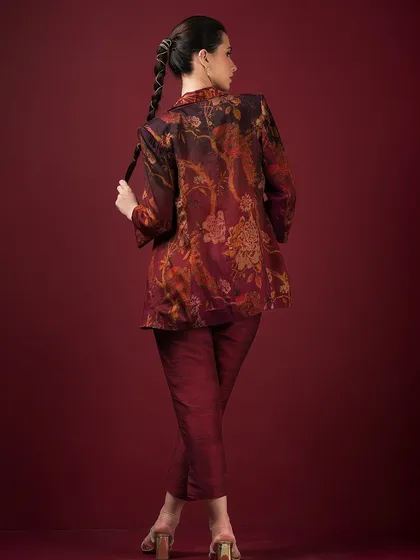 The back view of the printed blazer set, highlighting its sharp tailoring and unique pattern.