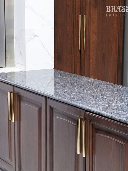 The long Kiah pulls used on pantry doors, demonstrating their suitability for larger-scale cabinetry.