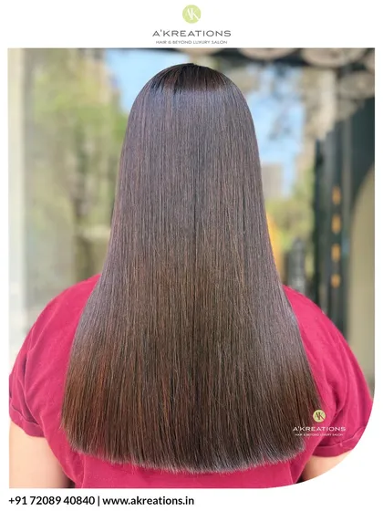 The beautiful result of a hair smoothing treatment. The hair is left glossy, straight, and incredibly healthy-looking.