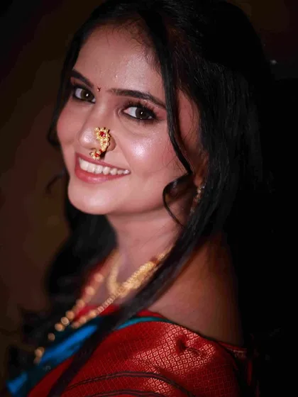 Her smile says it all. This close-up of the engagement look shows the natural yet polished finish, perfect for capturing beautiful memories.