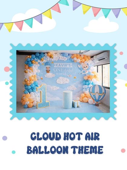 For Kavir's first birthday, we designed this adorable cloud and hot air balloon theme. The setup features a sky-blue backdrop with fluffy clouds, balloon garlands in orange and blue, and a custom "1" marquee number.