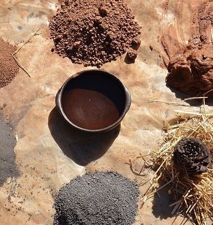 A collection of natural materials extracted directly from a project site. This image represents my hands-on approach to sustainable architecture, using locally sourced earth, lime, and other organic elements in construction.