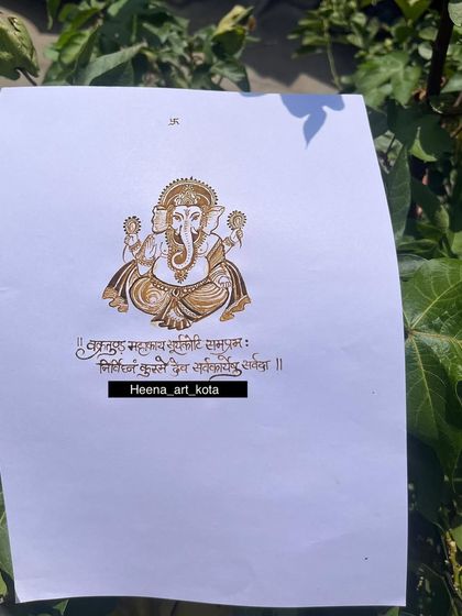 Another look at the detailed Ganesha figure created with henna on paper. This type of practice helps students master symmetry and fine details, which are essential for professional quality work.