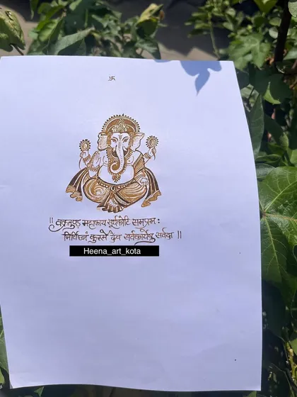 Another look at the detailed Ganesha figure created with henna on paper. This type of practice helps students master symmetry and fine details, which are essential for professional quality work.