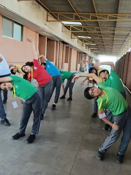 Our school programs emphasize discipline and teamwork. Students learn the importance of preparation and cool-downs as part of a complete athletic routine.