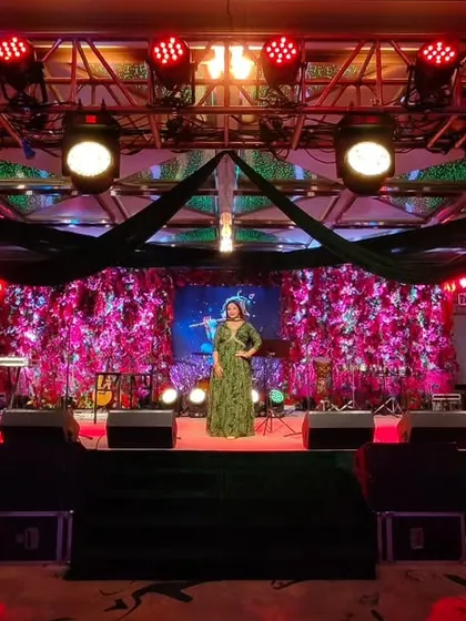 A wide shot of me hosting a concert for Madhava's Rock Band, showcasing my work in different genres.