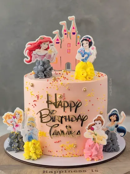 Another take on the Disney Princess theme, this 2kg Chocolate Mousse cake features princesses with piped whipped cream dresses.