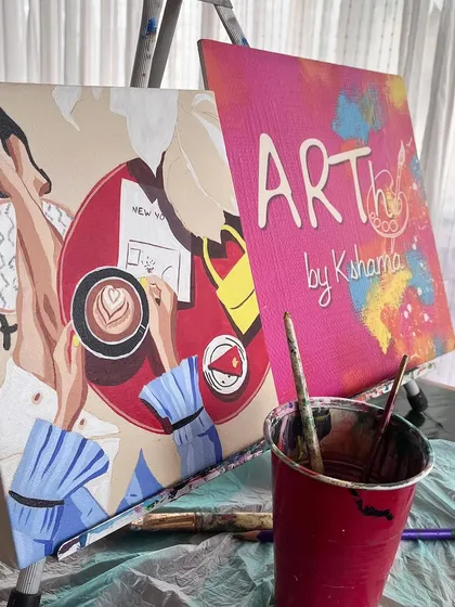 A close up of the setup for a coffee themed paint workshop, with the pre sketched canvas ready to be painted.