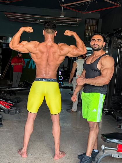 The back double bicep pose. We are working on bringing out the details and thickness.