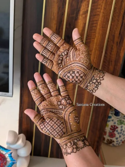 A more intricate design for Karwachauth, combining traditional patterns with floral elements.