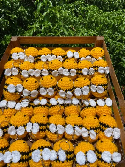 A crate full of sunshine. These classic yellow and black bee keychains are a consistent bestseller for my wholesale clients.