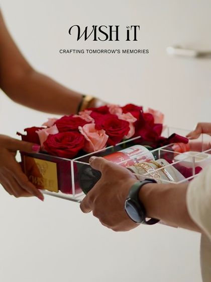 The moment of giving. Handing over our "Love Affair 2.0" box is more than just an exchange; it's about delivering a carefully crafted memory.