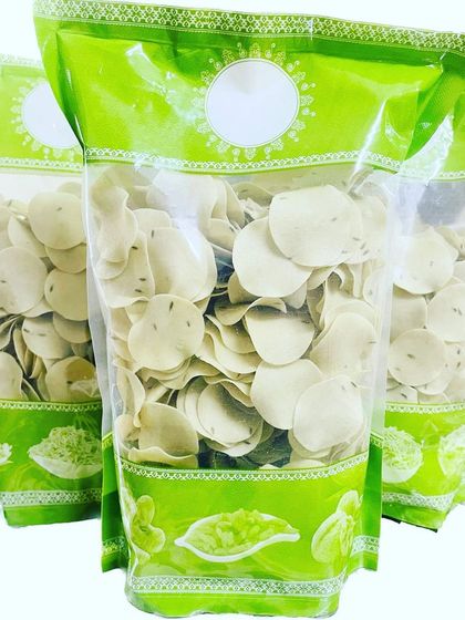 Another look at the Jeera flavored coin papads, packed and ready to go. These bite-sized crisps are a favorite with everyone.