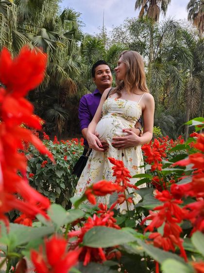 Surrounded by flowers and love. This photo captures the anticipation and happiness we felt while waiting for our daughter to arrive.