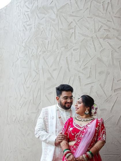 A classic portrait of the couple after their wedding, a core memory photo that is perfect for framing.