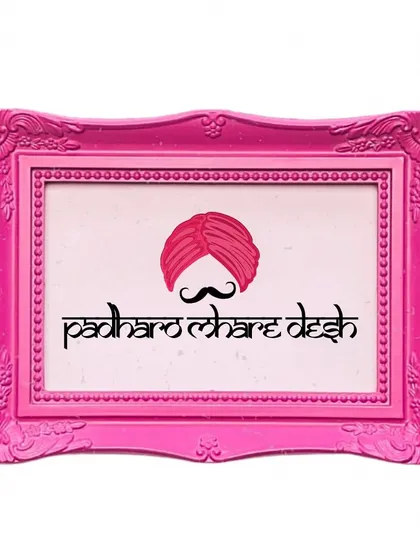 "Padharo Mhare Desh" - Welcome to my land. This sign, set in a traditional pink frame, welcomed guests to the Rajasthani fairytale wedding.