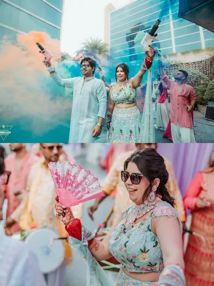 The couple makes a grand entrance to their Haldi party with colorful smoke bombs, setting a fun and festive tone for the event.