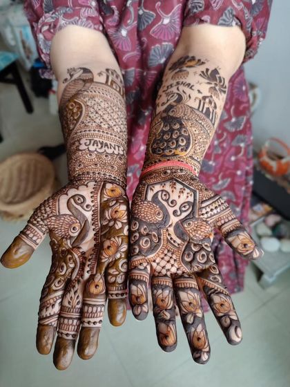 A beautiful and intricate design featuring peacocks and lotuses. The mix of bold figures and delicate fills creates a balanced and captivating look.