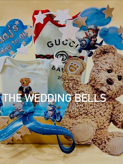 The complete half-birthday hamper for baby Siraaj, with a "halfway to one" theme, featuring cute teddy bears and designer apparel.