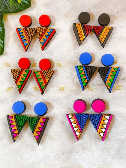 My modern, geometric earrings with a triangular drop. These are perfect for fusion or western wear and come in several bold color pairings.