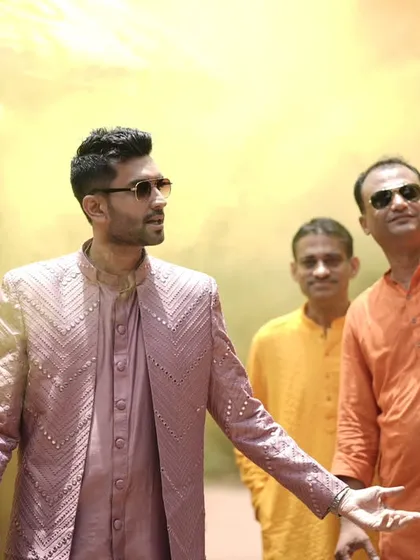 Making a grand entrance is key to setting the tone for the celebration. Here, I'm leading the charge at a Haldi ceremony, making sure the energy is high right from the start with color, music, and a whole lot of style.
