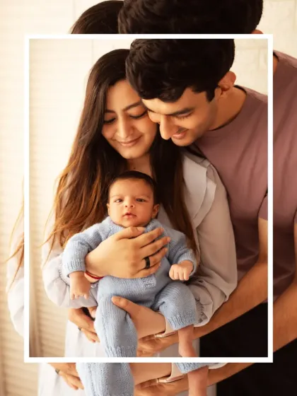 An intimate portrait of a new family, with the mother holding the baby while the father looks on lovingly. We focus on capturing genuine emotion and connection.