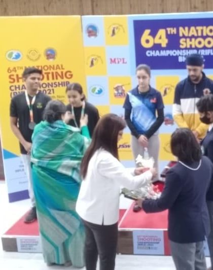 Our athlete Tilottama Sen on the podium at the 64th National Shooting Championship, after winning multiple medals in team and mixed events.