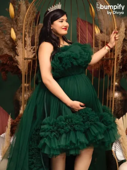 Rule your day in this emerald green high-low tulle gown. Paired with a crown, it’s a look that is both playful and regal.