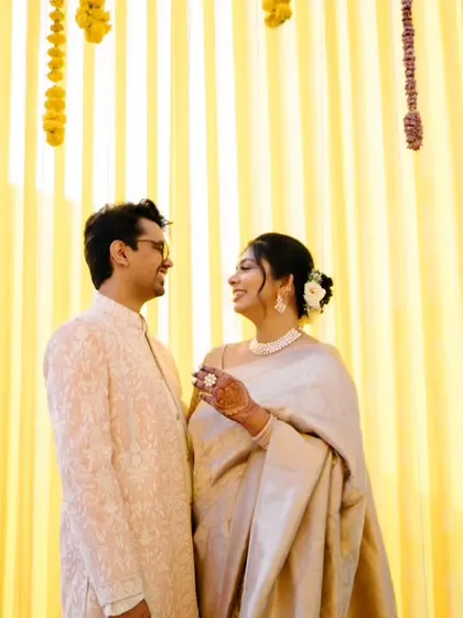 The beauty of a simple, intimate wedding. This portrait captures the quiet confidence and happiness of a couple on their special day, proving that love is the main event.