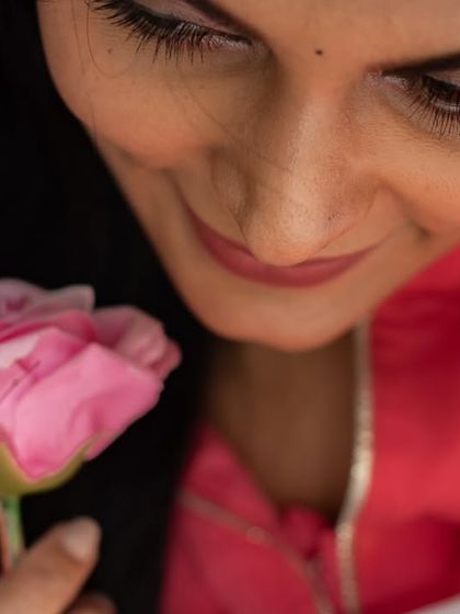 A delicate close-up focusing on a simple, beautiful detail. This artistic shot highlights a moment of quiet appreciation.